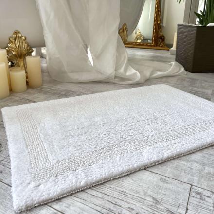 Килимки у ванну кімнату